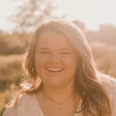 Chiropractic Technician Myah Smiling In Nature